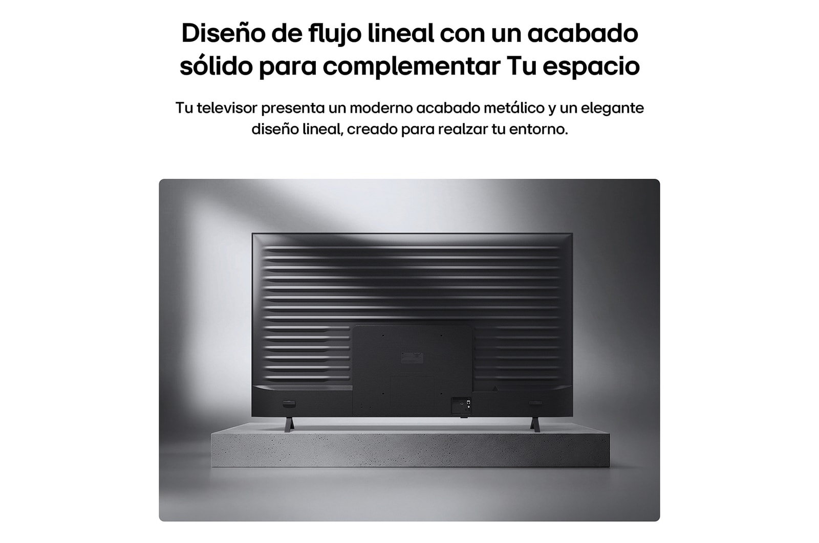 LG QNED AI QNED74 Mini LED is shown from the back, revealing a metallic rear panel with evenly spaced horizontal ridges that create a clean, structured look and emphasize the Linear Flow Design across the entire surface.
